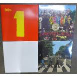 Four Beatles LP records, 2009 issue (three sealed)