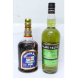 Two bottles, British Navy Pusser's Rum and Chartreuse Liqueur