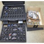 A Games Workshop Warhammer carry case, figures, book and scenery