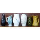 Six vases including Wedgwood, Poole and Sylvac, (blue and yellow jugs a/f)