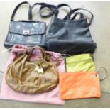 A Radley handbag, four others and a purse