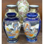 Two pairs of oriental vases and an oriental egg