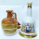 Two decanters, Scottish Whisky, marked Donald Fisher Ltd., Edinburgh and a Bell's 1986 Royal