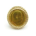 A 1910 full sovereign in a 9ct gold ring mount, total weight 16.5g, P
