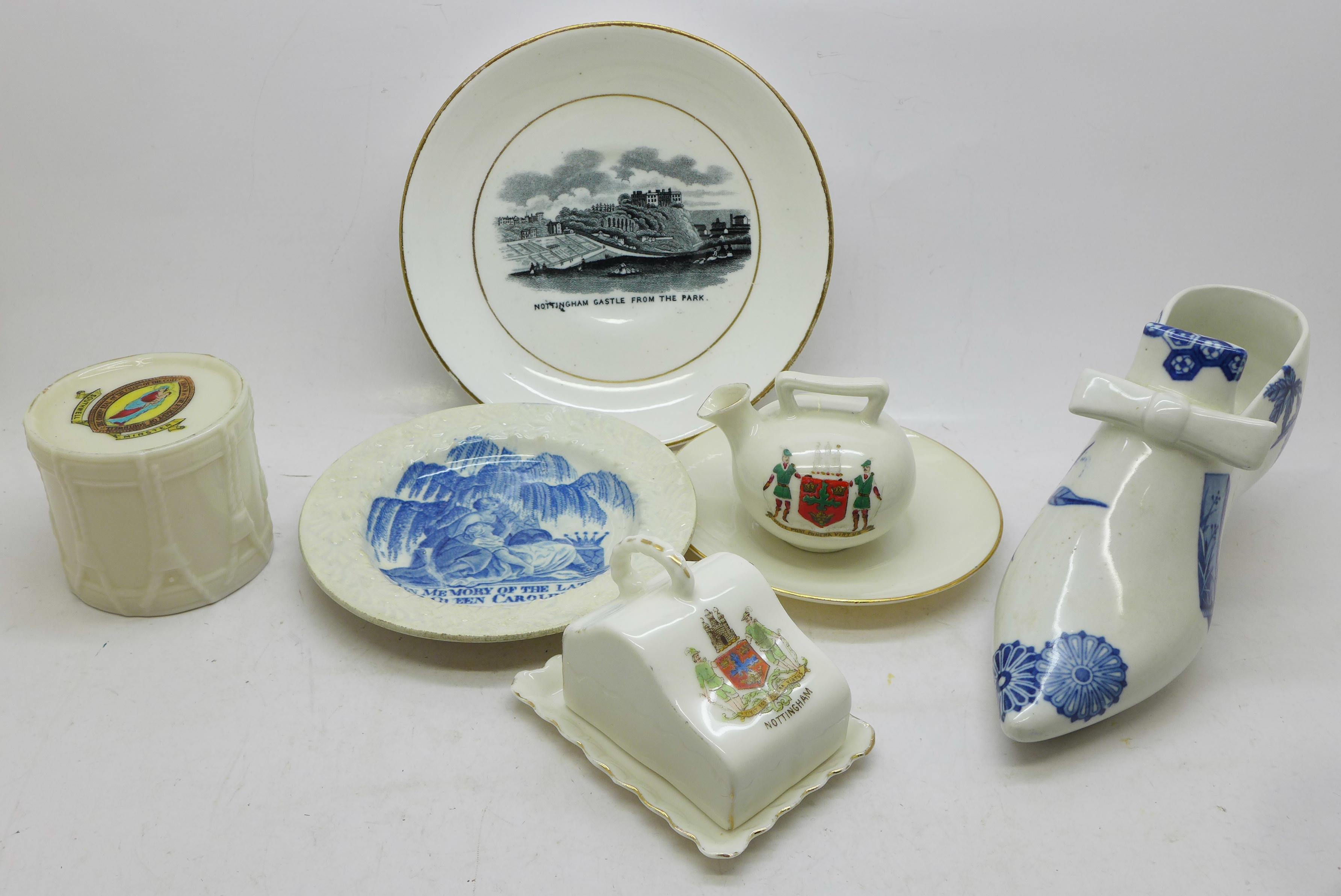 Four items of crested china, a Southwell Minster drum and three Nottingham, a Nottingham view