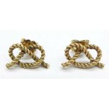 A pair of 9ct gold 'knot' earrings, 2.5g