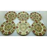 A set of six Royal Crown Derby 1128 pattern plates, 16cm