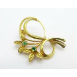A 9ct gold and emerald brooch, 3.2g