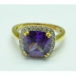 A silver and amethyst cluster ring, V