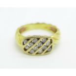 An 18ct gold and diamond ring, marked 750, 5.7g, O