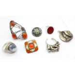 A silver and abalone cabochon ring, a silver and cornelian ring, an enamel and orange stone