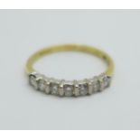 An 18ct gold, seven stone diamond ring, 2.5g, P