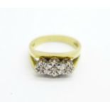 An 18ct gold and diamond ring, 5.6g, L