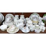 A collection of Royal Doulton Brambly Hedge tea and dinnerwares, a lamp base, clock, etc.