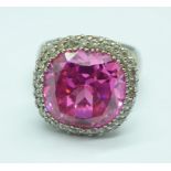 A silver and large pink stone cluster ring, U