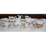 A collection of twelve Royal Worcester jugs, The Historic Jugs, with certificates
