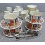 An eight setting tea set and four M & S cups and saucers decorated with postage stamps **PLEASE NOTE