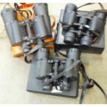 Three pairs of binoculars