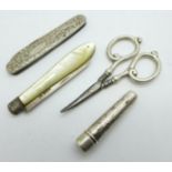 A pair of silver handled scissors, a silver penknife, a silver bladed fruit knife, a silver