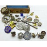 Victorian solitaire buttons, an Art Deco style bulldog figure, badges, a compass, etc.