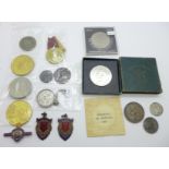 A collection of coins and medallions