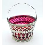 A French silver basket with red glass liner, French control marks, 33g