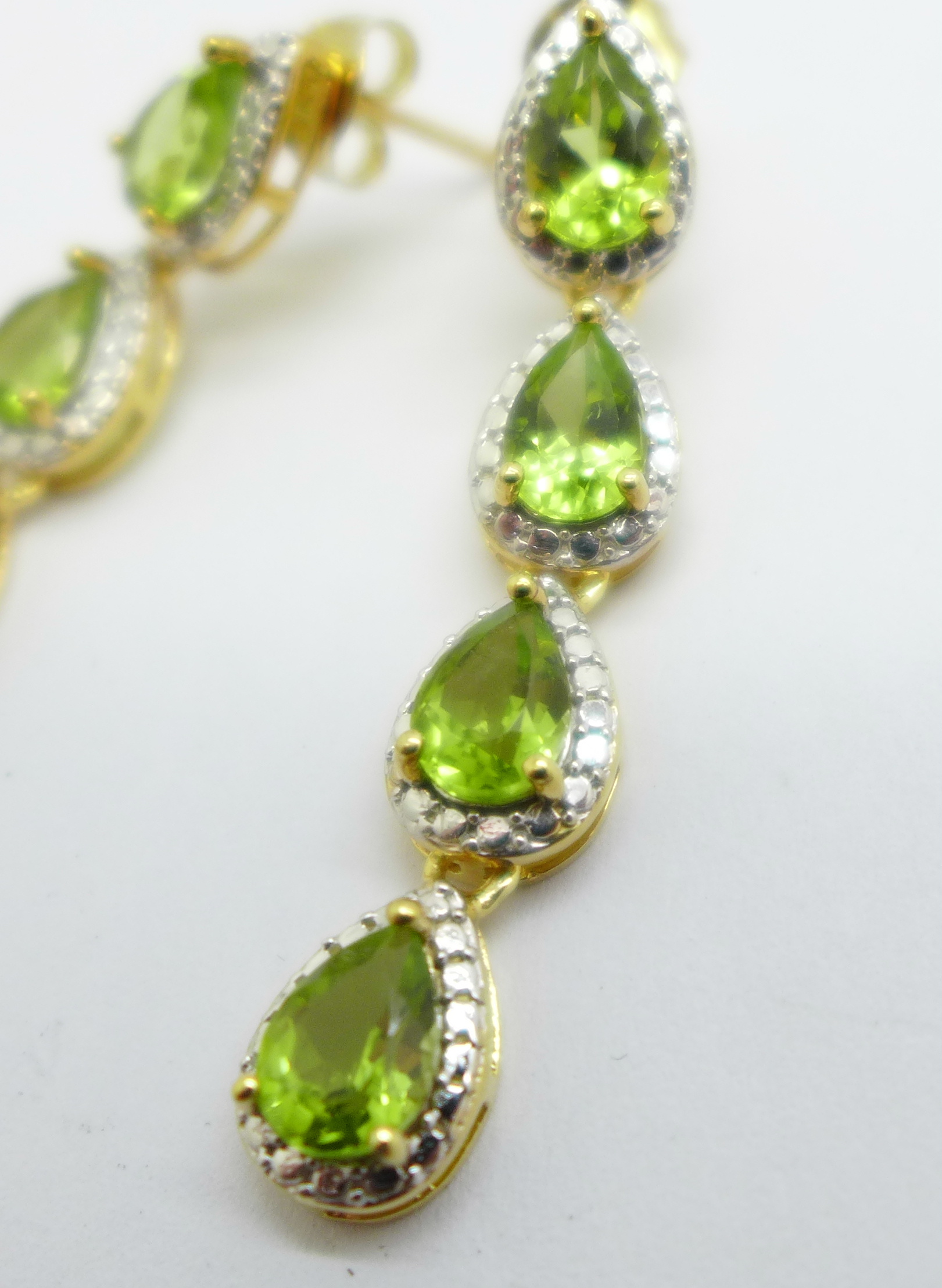 A pair of silver gilt and peridot pendant earrings - Image 2 of 2