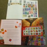 A 2005 Collection of Singapore stamps and one other album of stamps