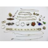 A silver bracelet, other silver jewellery, two metal brooches and a silver thimble, (some a/f