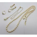 A freshwater pearl necklace with 14ct gold clasp, a pair of 9ct gold earrings, a 9ct gold and