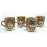 The Beatles, set of four mugs, each group member in Sgt. Pepper's outfits, 1970's