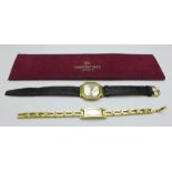 A Raymond Weil 18ct gold plated wristwatch and a lady's Gucci wristwatch