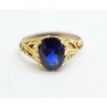 A yellow metal and single sapphire set ring, 2.7g, N