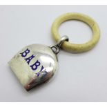 A hallmarked silver and enamel 'Baby' rattle, Birmingham 1926, (ring a/f, cracked)