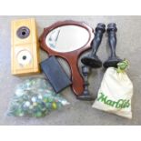 An Edwardian inlaid hand mirror, a pair of ink bottles, ebonised candlesticks and two bags of