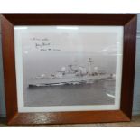 A framed photograph of HMS Nottingham, signed by the Captain