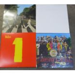 Four Beatles LP records, 2009 issue (three sealed)