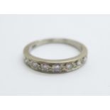 An 18ct gold, seven stone diamond ring, 4.1g, O