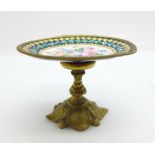 A miniature oval stand, gilt metal and enamelled with painted flowers, a/f