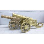 A pair of heavy brass models of cannons **PLEASE NOTE THIS LOT IS NOT ELIGIBLE FOR POSTING AND