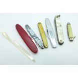 Six penknives and a mother of pearl knife