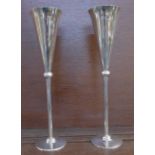 A pair of tall silver wine flutes with gilt interiors, by Carrs, cased, 470g