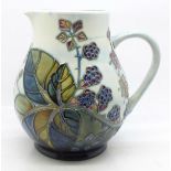 A Moorcroft Bramble pattern jug by Sally Tuffin, 15cm
