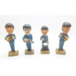 The Beatles, set of four plaster figures