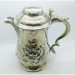 A Victorian silver plated embossed tankard, 21cm
