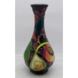 A Moorcroft vase (shape no. QC80/6) Queens Choice pattern, 17cm