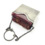 A silver Prayer and Hymn Book holder, 44g with a miniature prayer and hymn book