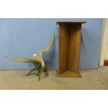 A large brass figure of an eagle and an oak book trough