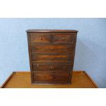 A Victorian pine and mahogany table top chest of drawers, 41cms h x 31cms w