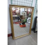 A gilt framed mirror